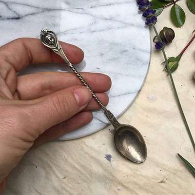 Кофейная ложка с лицом на ручке мельхиор