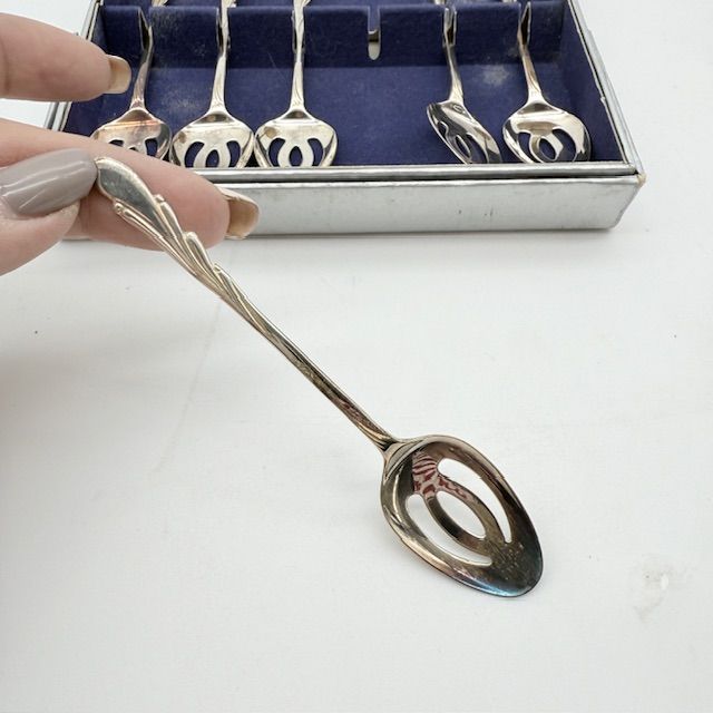 Ложка кофейная с прорезями Melkunie 12 см серебрение Голландия