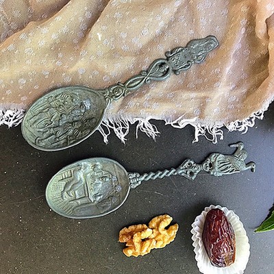 Ложка оловянная с птицами на ручке и рельефным изображением