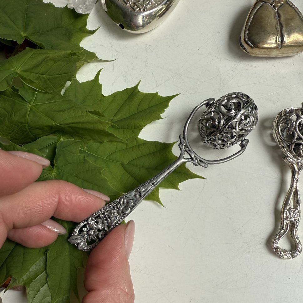 Погремушка Колесо ажурное 10 см серебро