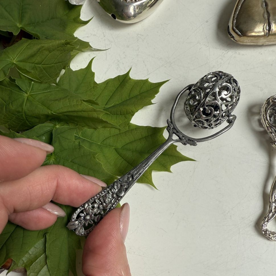 Погремушка Колесо ажурное 10 см серебро