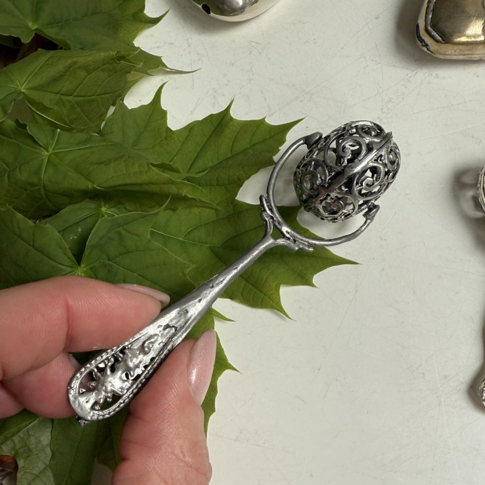 Погремушка Колесо ажурное 10 см серебро